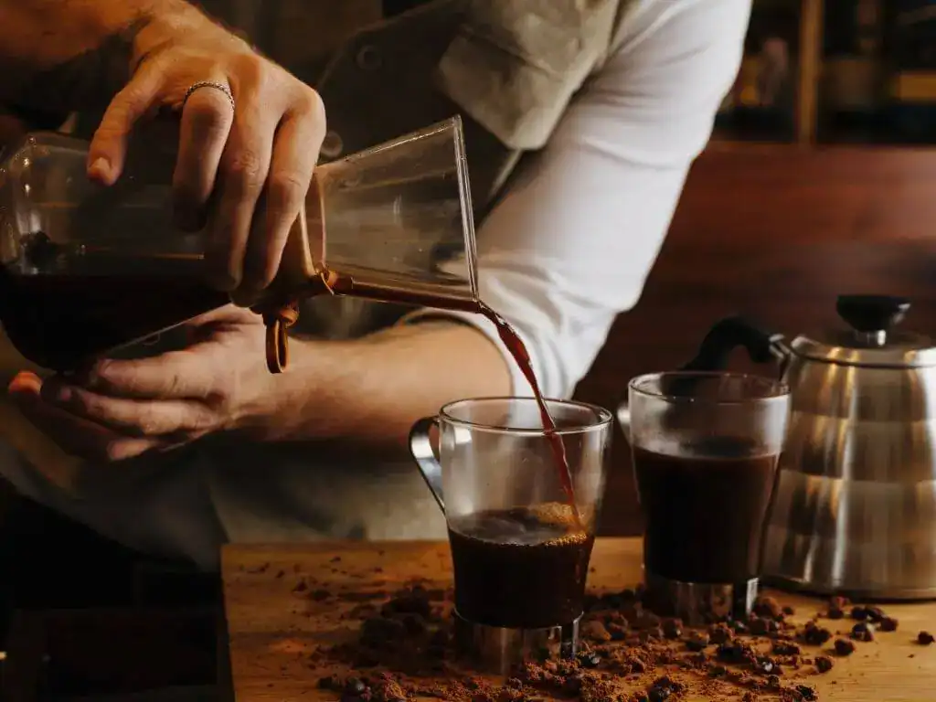 a barista making coffee