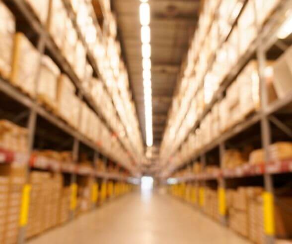 defocused image of warehouse shelving