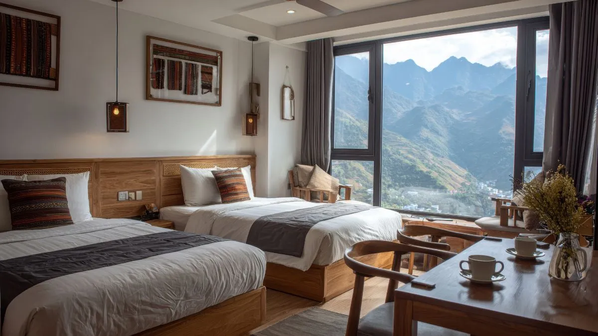 a view of a hotel room with magnificent scenery at the window